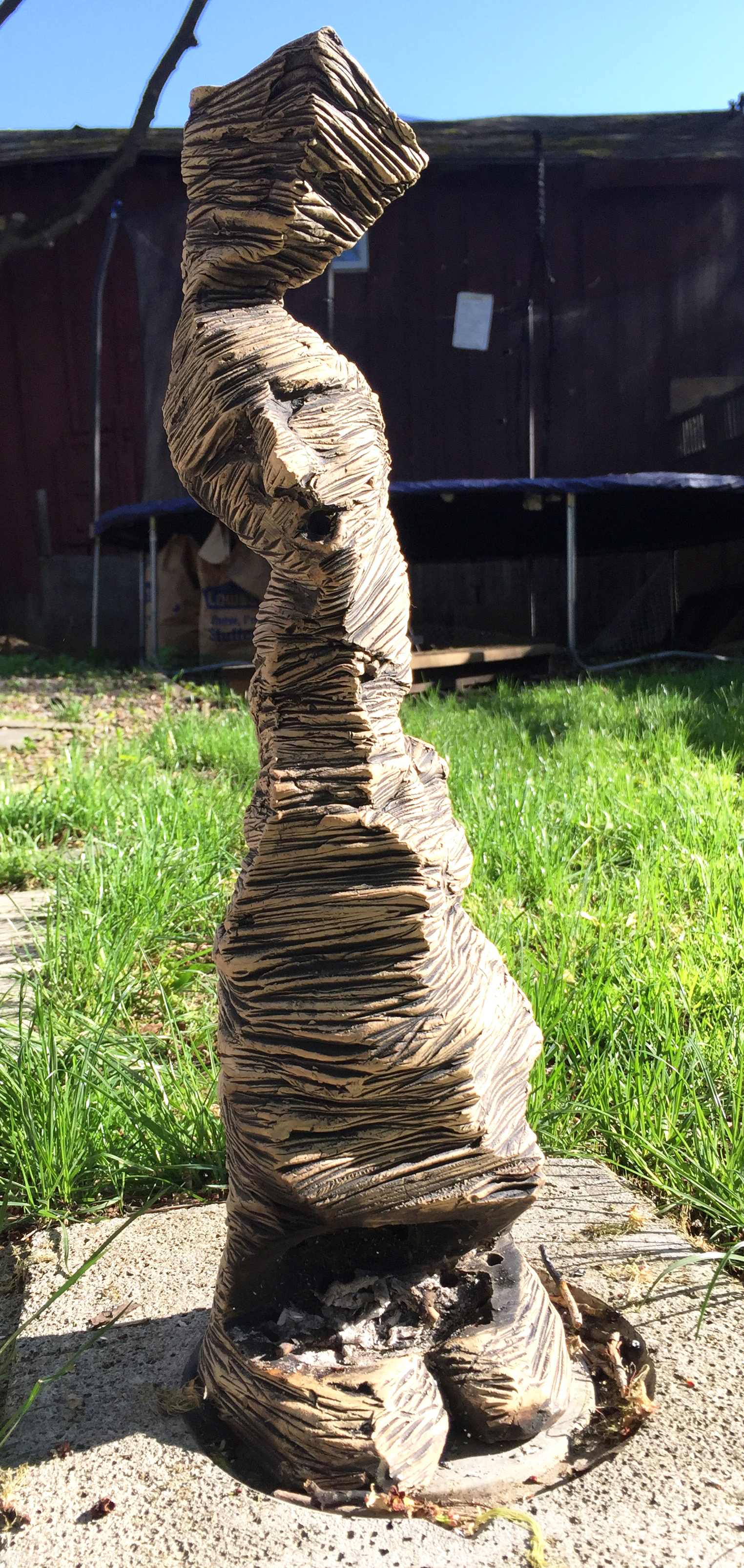 First Face ceramic chiminea with a face